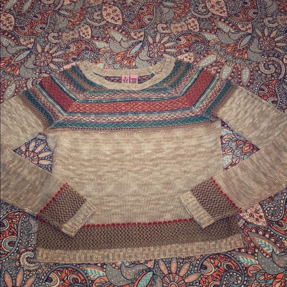 Tan, coral, and teal sweater